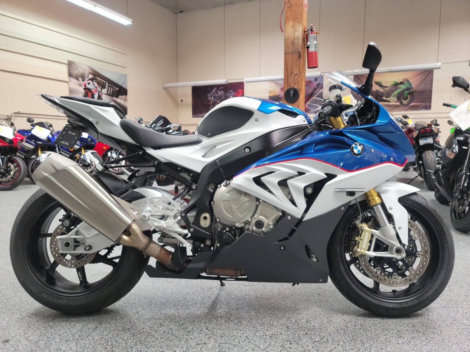 What is the BMW S1000RR and how does it compare to Japanese litre