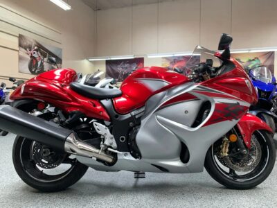 Red and silver sport motorcycle on display inside a showroom
