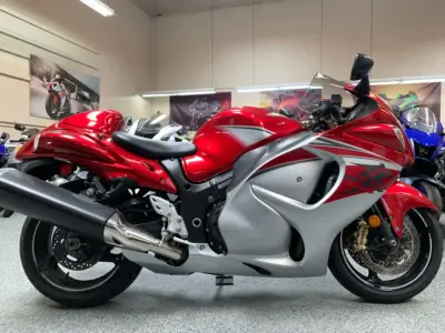 Red and silver sport motorcycle on display inside a showroom